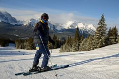 06 Charlotte Ryan Skiing Just Below Glacier Chairlift With Mount Temple and Mount Victoria Behind.jpg